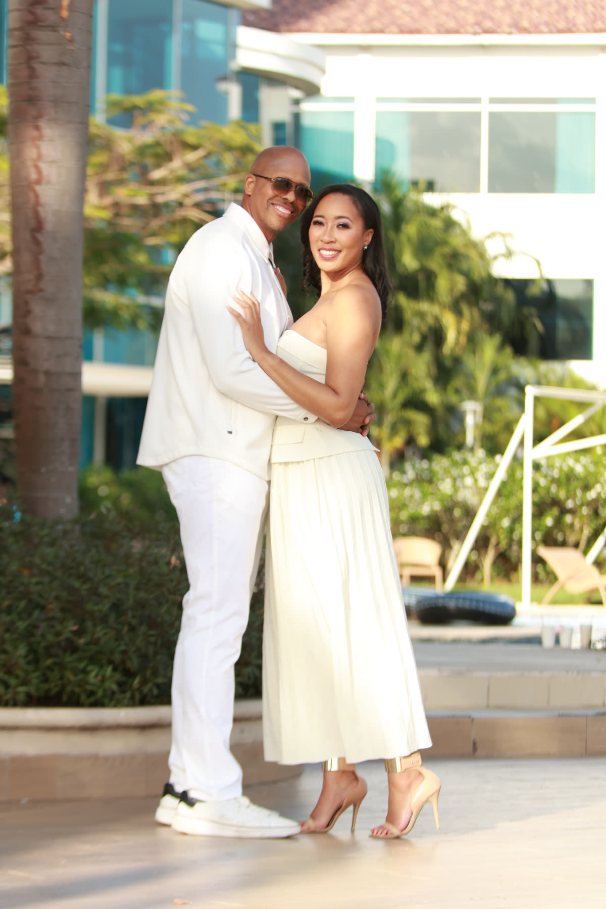 Breanna and Rob embracing in a garden